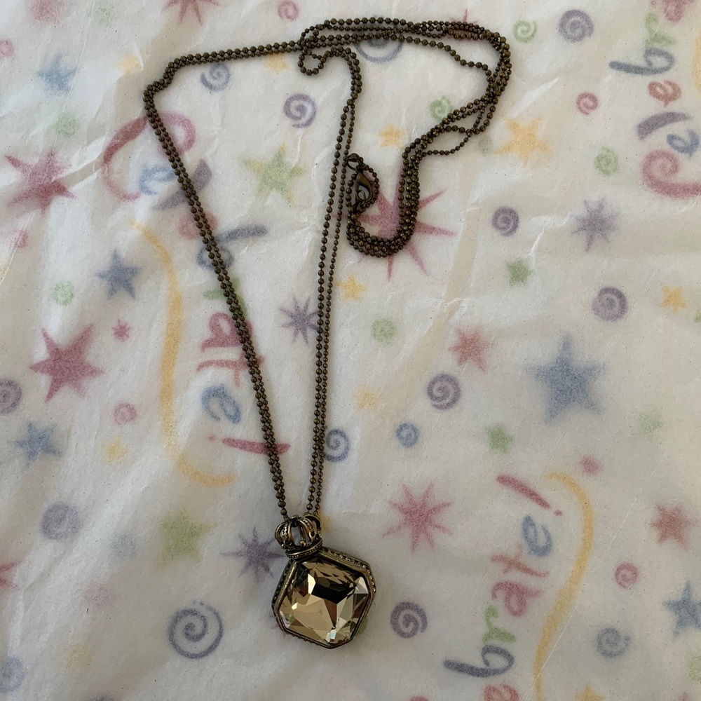 Long stunning crown necklace.